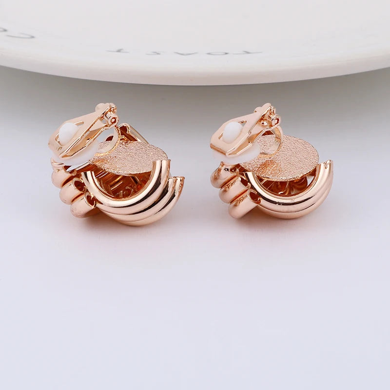 Boucles d'oreilles à clip vintage non percées, boucles d'oreilles géométriques en métal doré pour femmes.