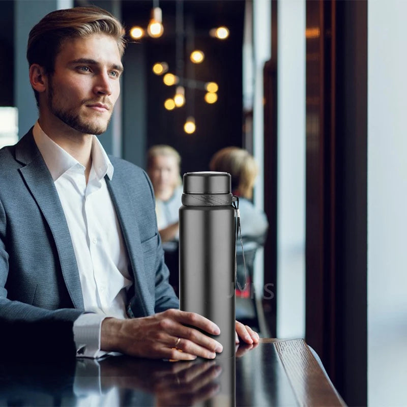 Bouteille thermos en acier inoxydable 1L, garde vos boissons chaudes ou froides – idéale pour eau, thé, café, avec flacon à vide performant.