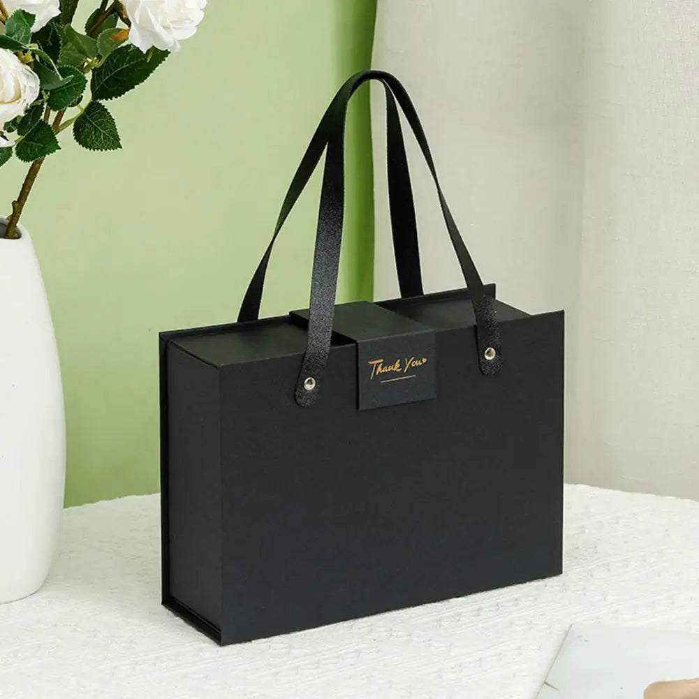 Coffret cadeau à fermeture magnétique, élégant avec fermeture cachée.
