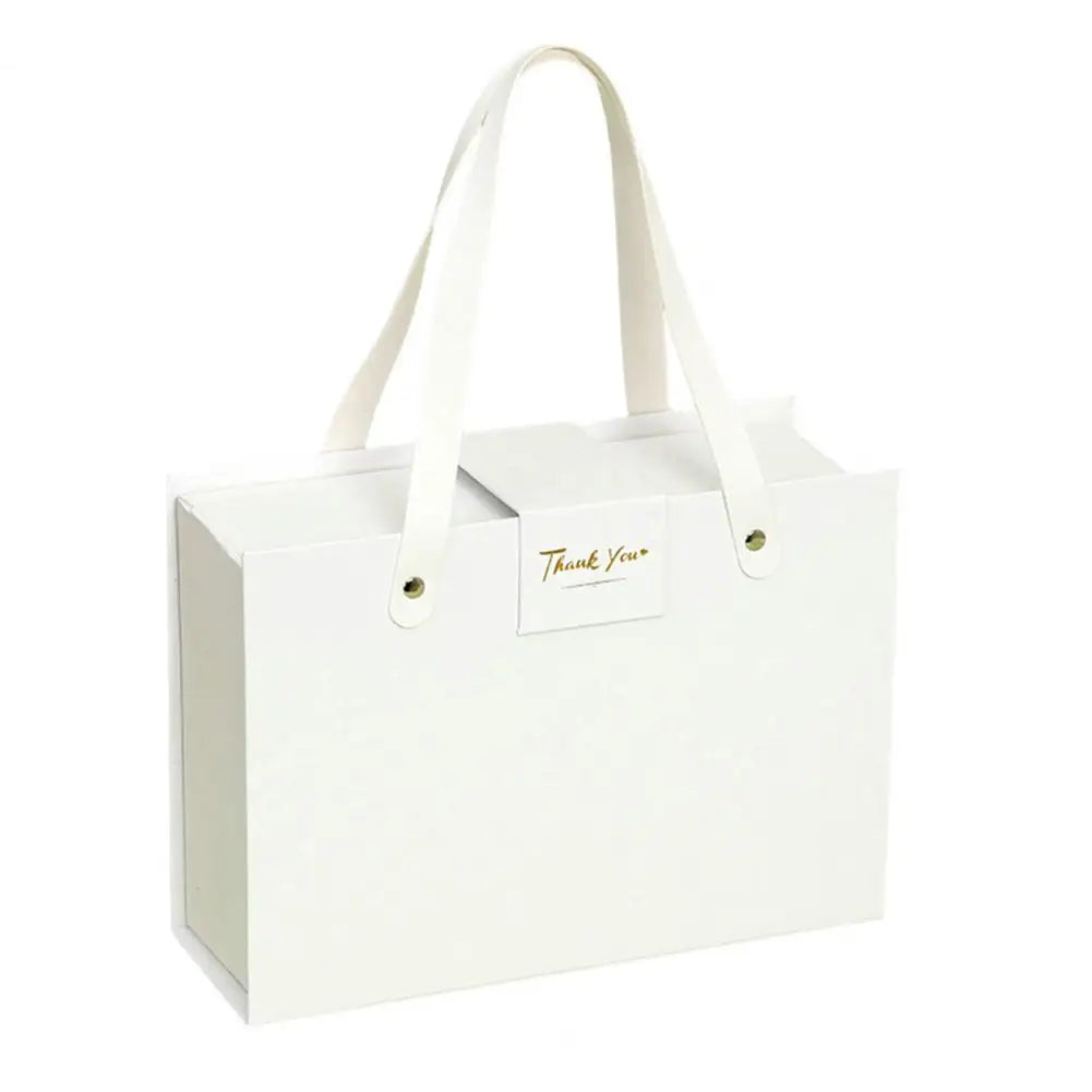 Coffret cadeau à fermeture magnétique, élégant avec fermeture cachée.