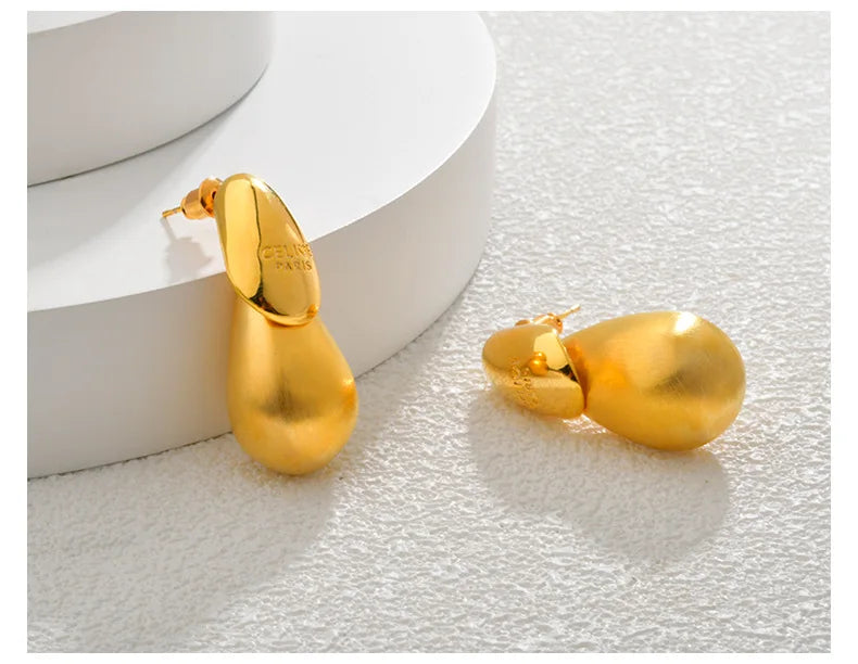 Boucles d'oreilles goutte d'eau transparentes pour femmes, plaquées or, élégantes et modernes